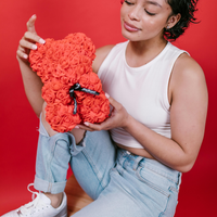 small rose teddy bear made of flowers