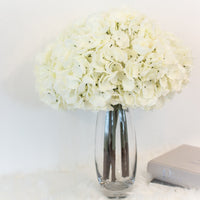 elegant artificial flowers in vase for luxury coffee table decoration