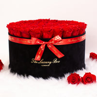 red infinity roses in giant xxl black box for valentine's gift