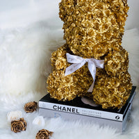 gold rose bear made of roses with flowers