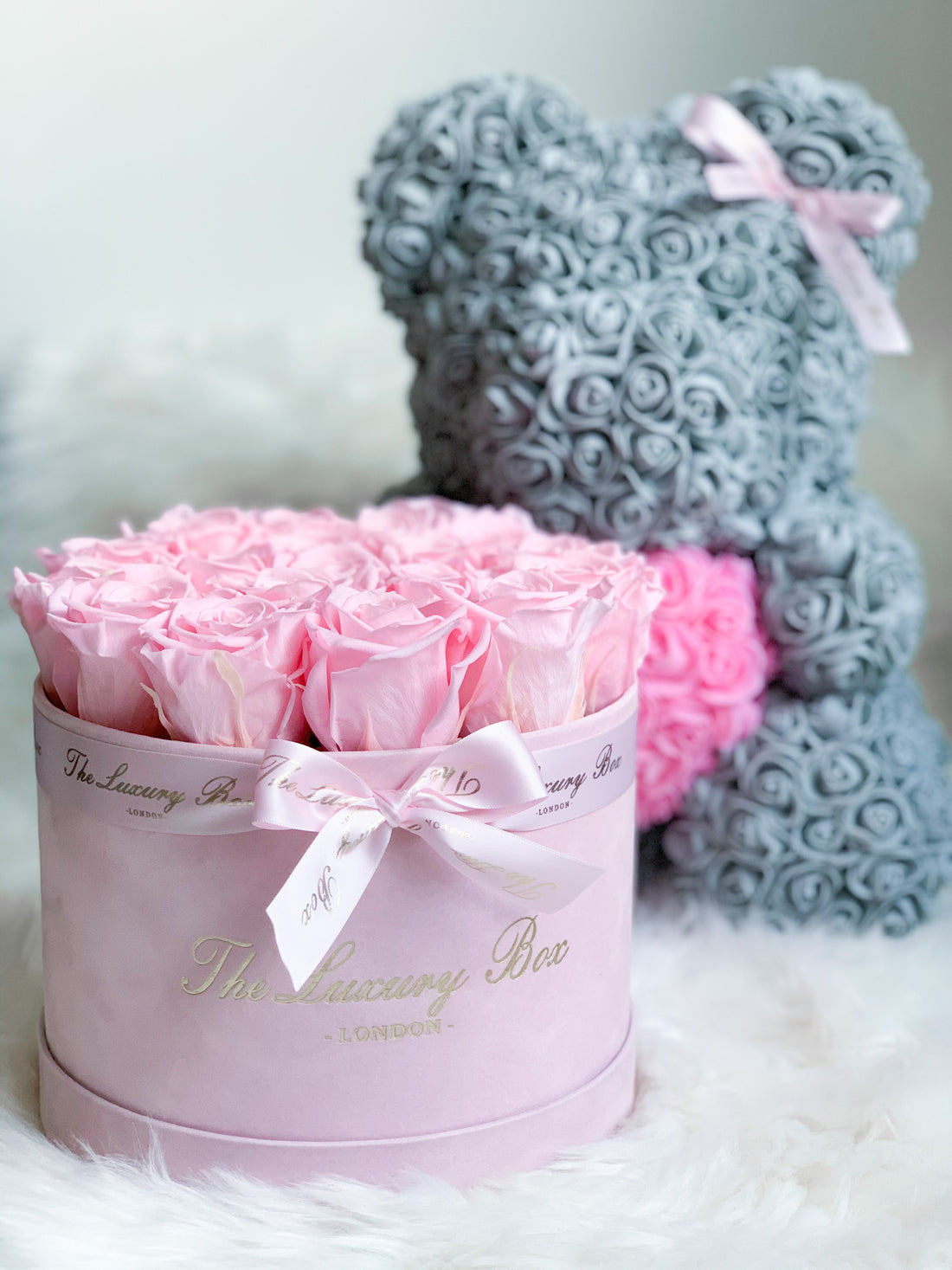 pink eternity roses in pink velvet box with rose bear