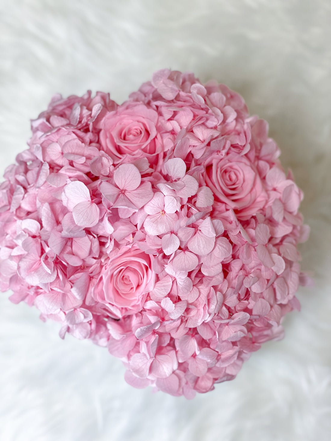 Pink preserved hydrangea and pink infinity roses flower box for flower delivery in UK