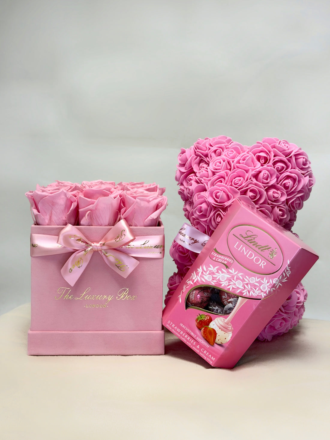 Pink gift hamper set infinity roses, chocolate and rose bear for valentine's day