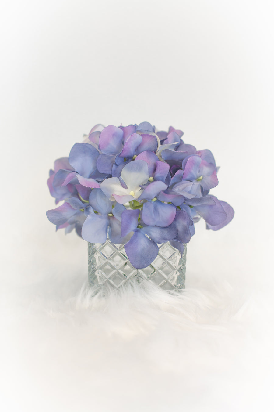 cute purple blue artificial flowers in vase for luxury home decoration