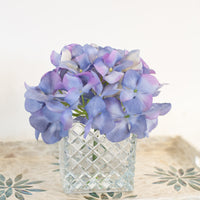 cute purple artificial flowers in vase for luxury home decor