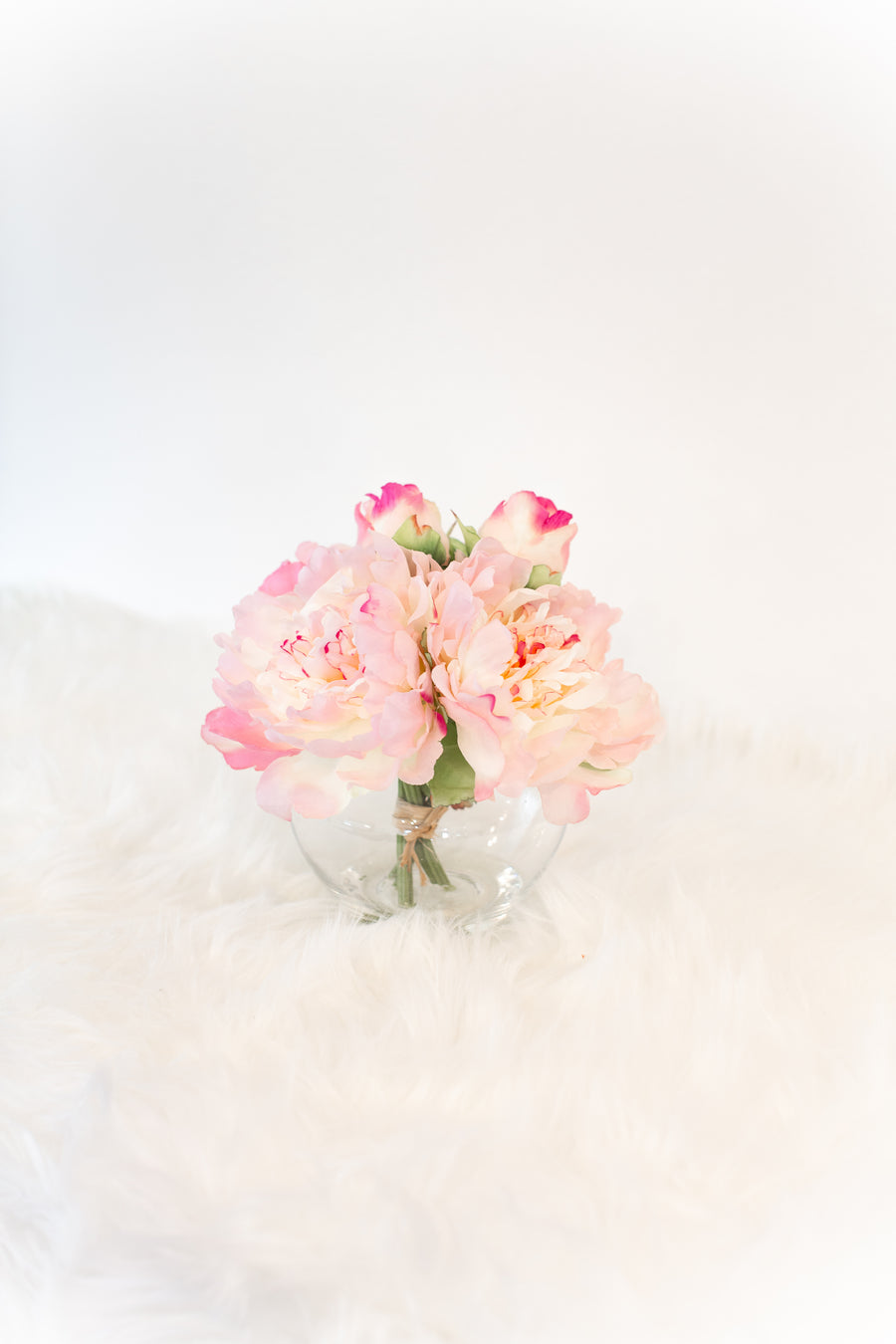 peach and pink artificial flowers in vase for coffee table luxury home decoration
