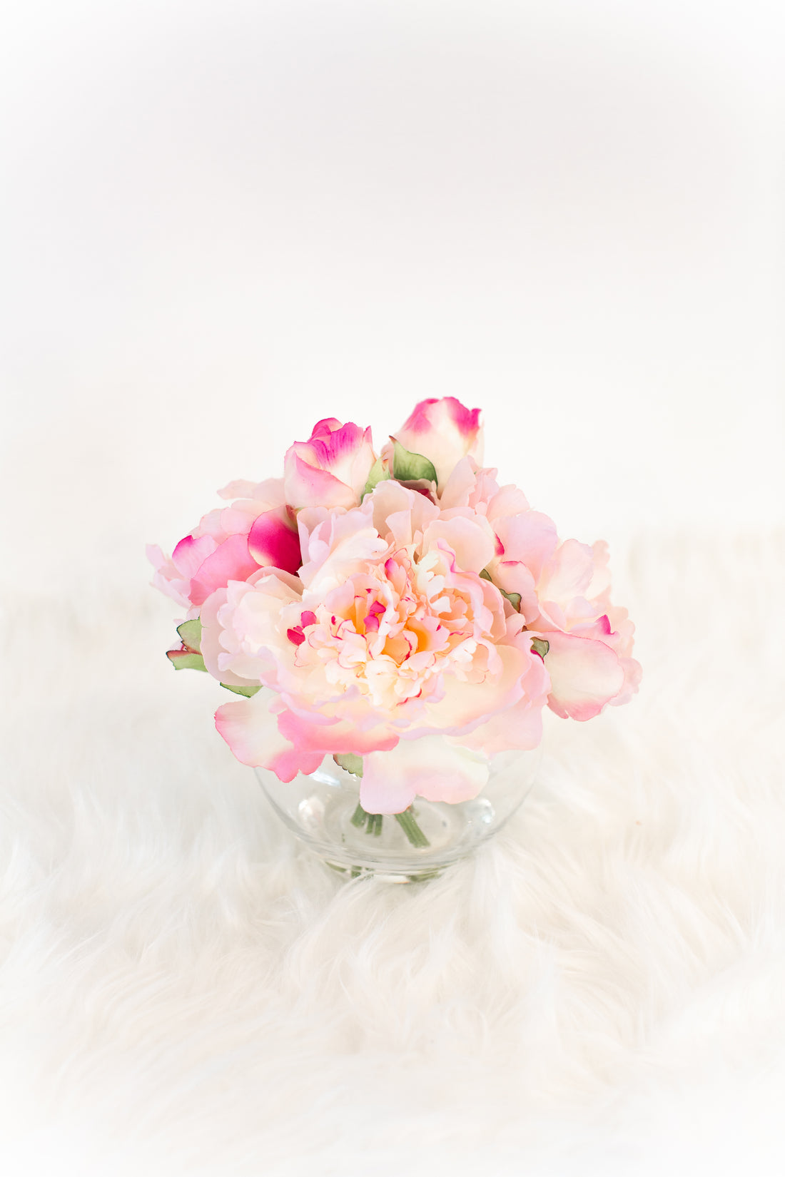 peach and pink artificial flowers in vase for coffee table luxury home decor