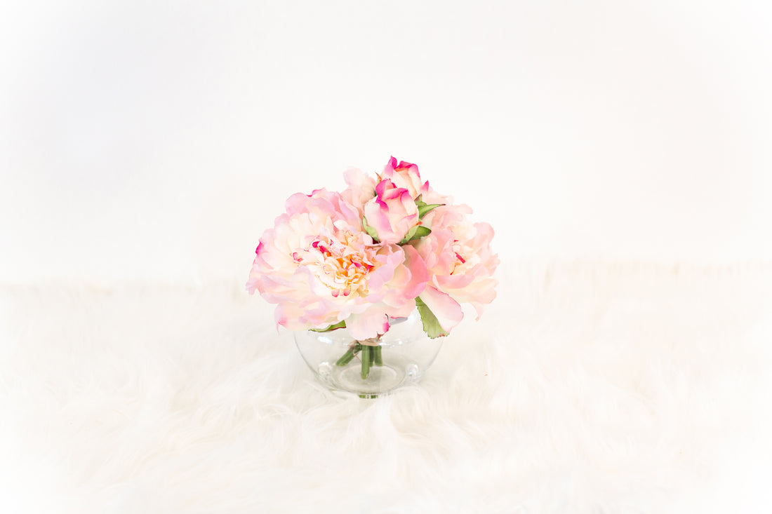 peach and pink artificial flowers in vase for coffee table luxurious home decoration
