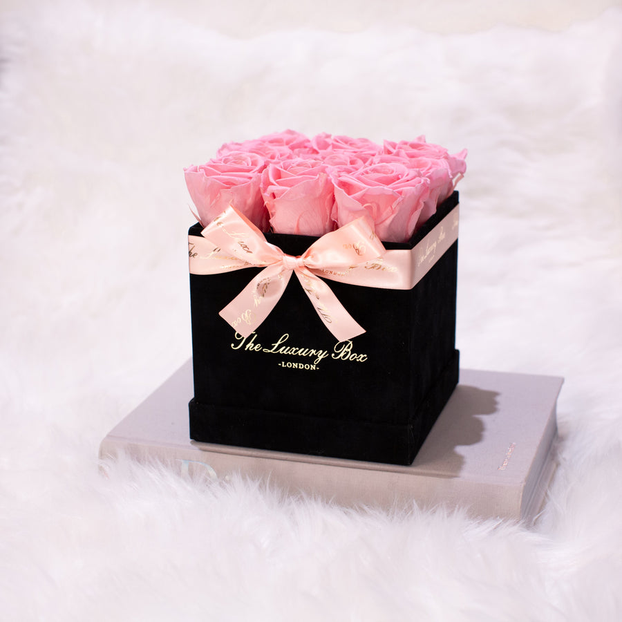 pink infinity roses in black rose box