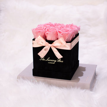 pink infinity roses in black rose box