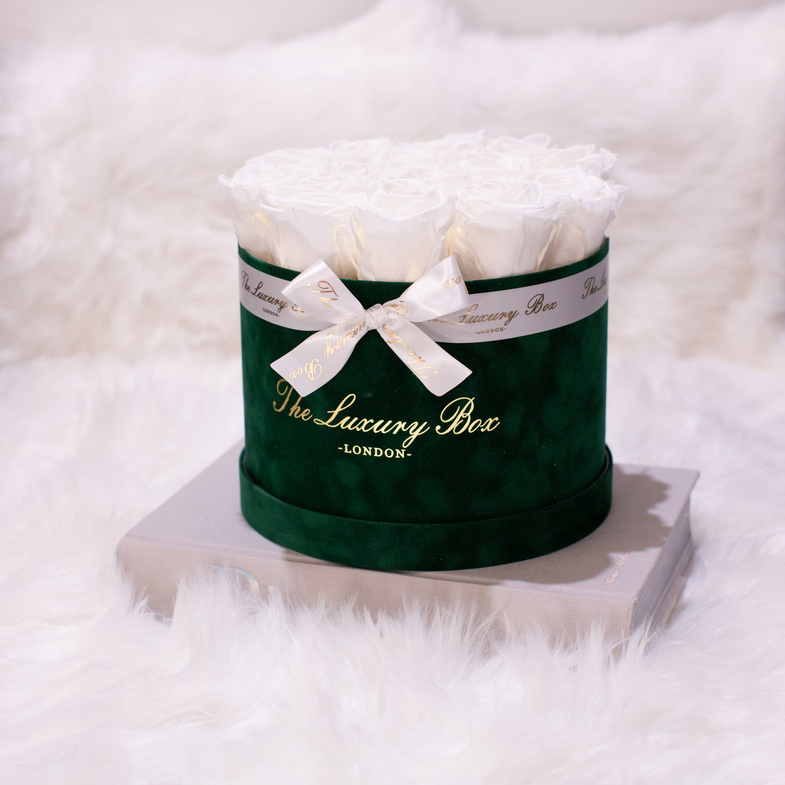 white infinity roses that last in a green velvet box christmas presesnt for her