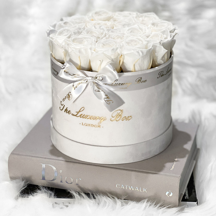 white preserved eternity roses in white velvet box gift for bride or wedding gift