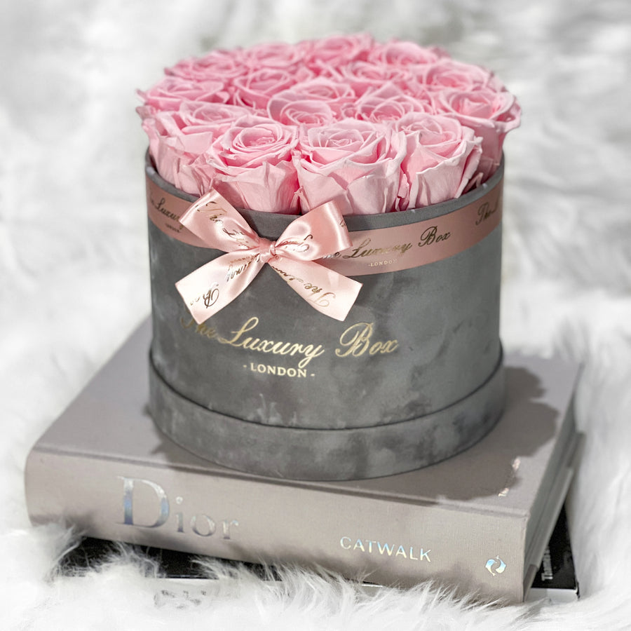 pink eternity roses in grey velvet box