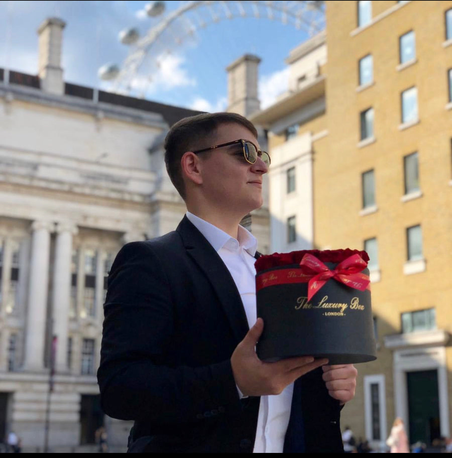 man with gift for him for valentine's
