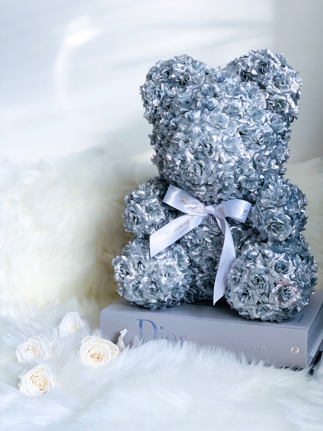 silve rose bear made of flowers with roses