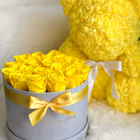 yellow rose teddy bear with preserved eternity roses in box